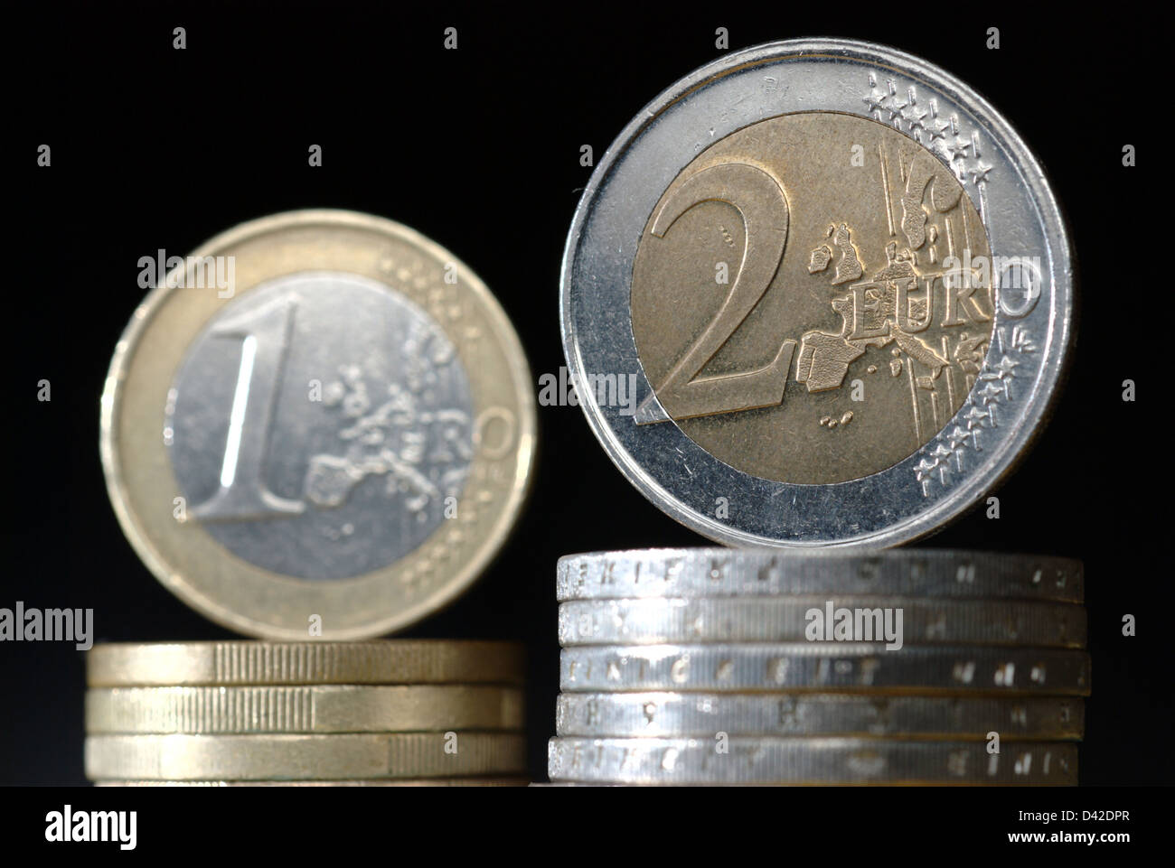 Muenster, Germany, coin stack with one-and two-Euromuenzen Stock Photo
