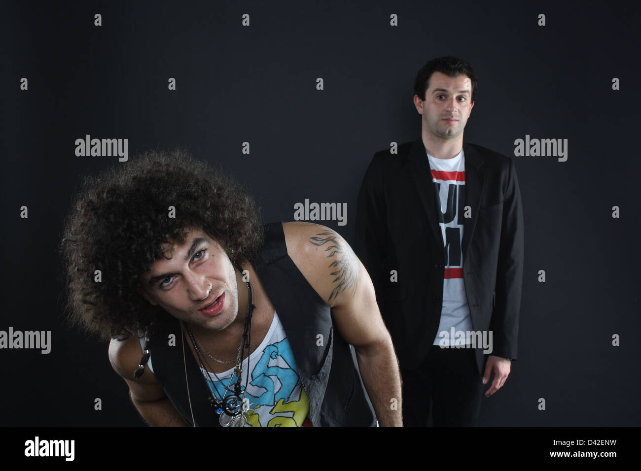 Man looking up, with another man stood behind him Stock Photo Alamy