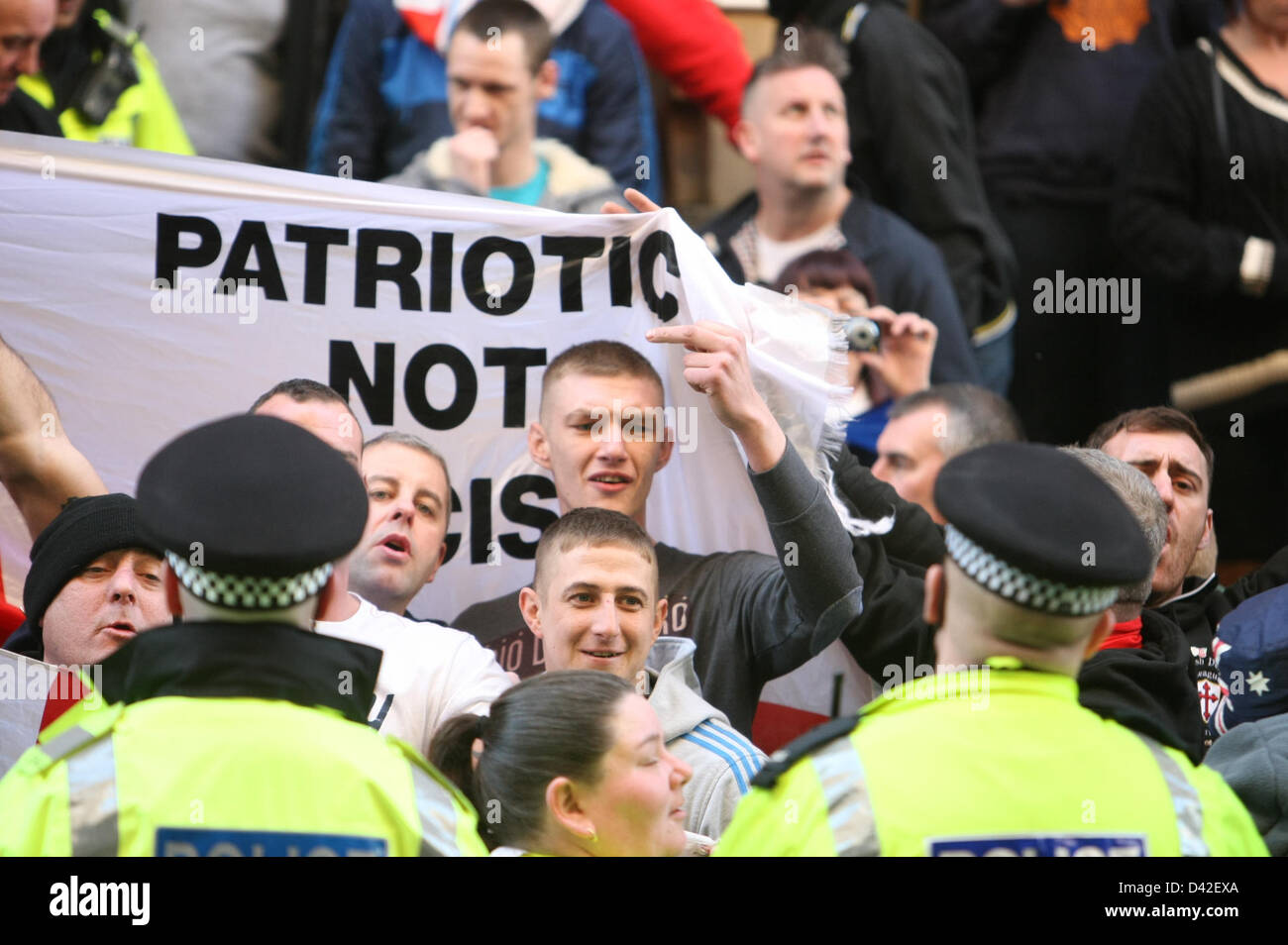 Manchester, UK 2nd March 2013, English Defence League Members at the 'Walkabout' bar before being bused to Quay Street to march to a rally held in Manchester's Albert Square. Credit: Martyn Wheatley/Alamy Live News Stock Photo