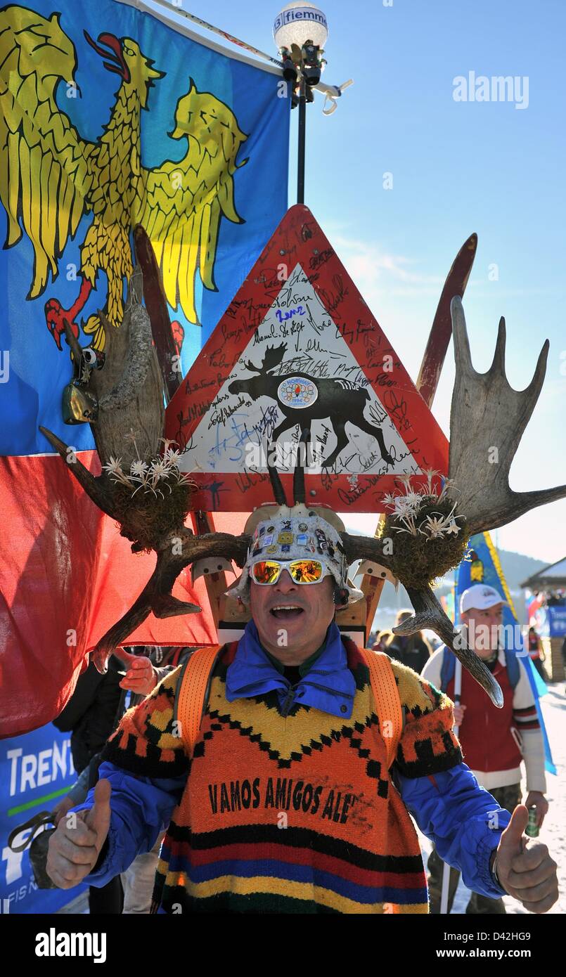 A Fan of the Ski Team from Norway celebrates during the Ladie's 30 km mass start at the Nordic Skiing World Championships in Val di Fiemme, Italy, 02 March 2013. Photo: Hendrik Schmidt/dpa Stock Photo