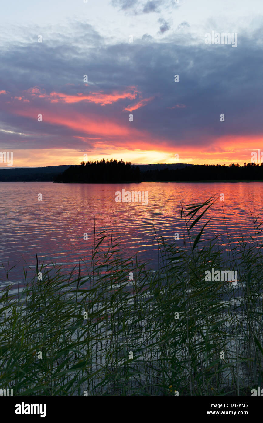 Storsa Lesjoen, Sweden, at sunset on a lake Storsa Lesjoen Stock Photo