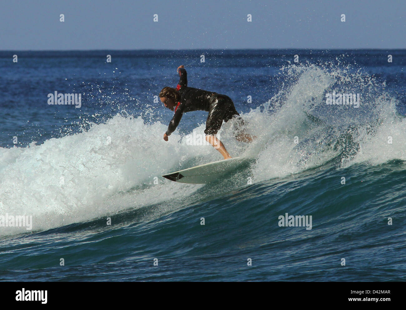 surfer riding wave Hawaii the Big Island pacific ocean surf surfing Stock Photo