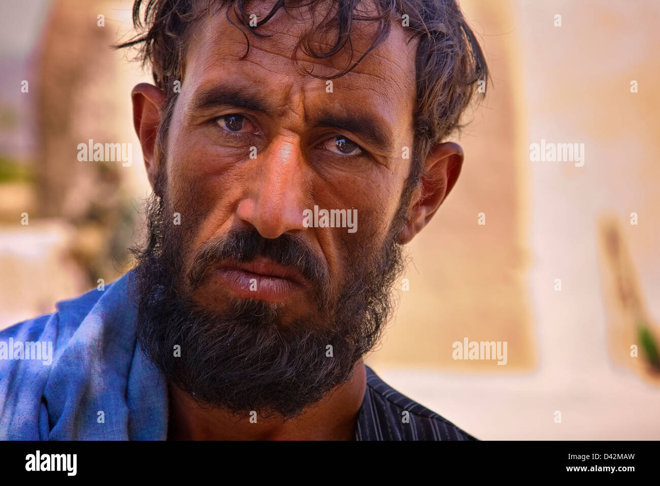 Kandahar, Afghanistan - June 22, 2010: The face of an Afghan man shows the years of strain endured by his country. Stock Photo