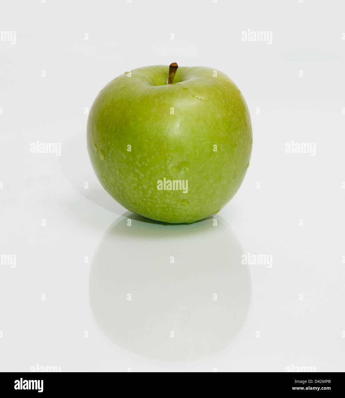 Ripe green apple on a white background Stock Photo