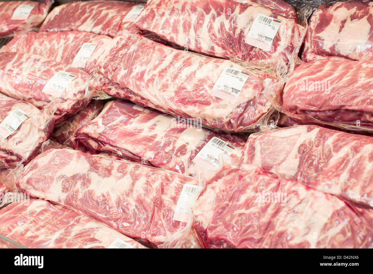 Pork ribs on display at a Costco Wholesale Warehouse Club. Stock Photo