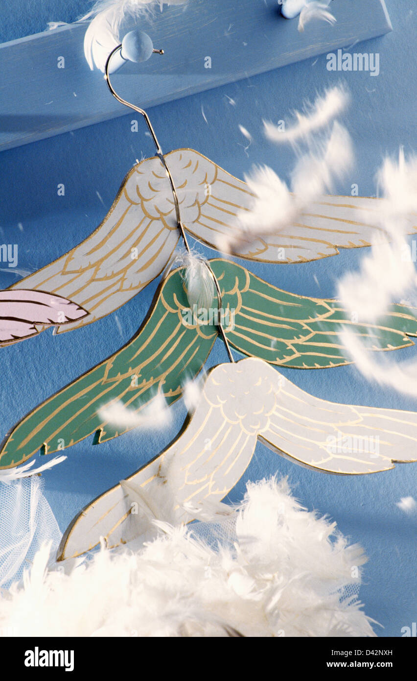 Closeup of white angel's wings coat hangers Stock Photo Alamy