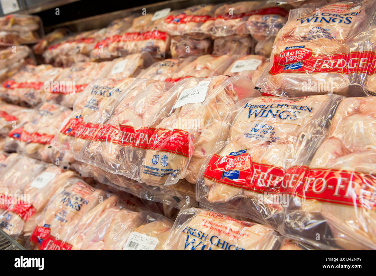 Chicken wings on display at a Costco Wholesale Warehouse Club. Stock Photo