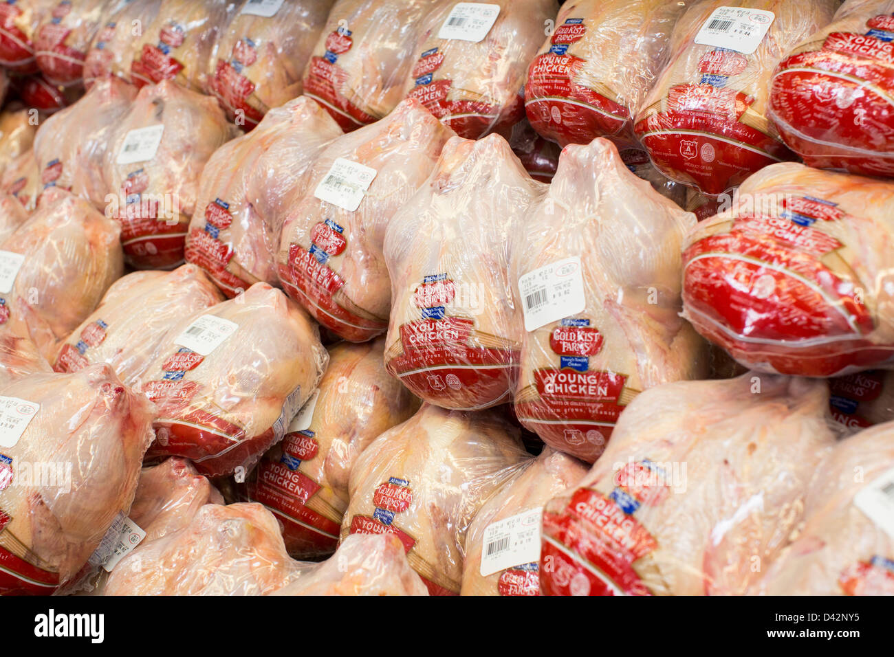 Whole chickens on display at a Costco Wholesale Warehouse Club. Stock Photo