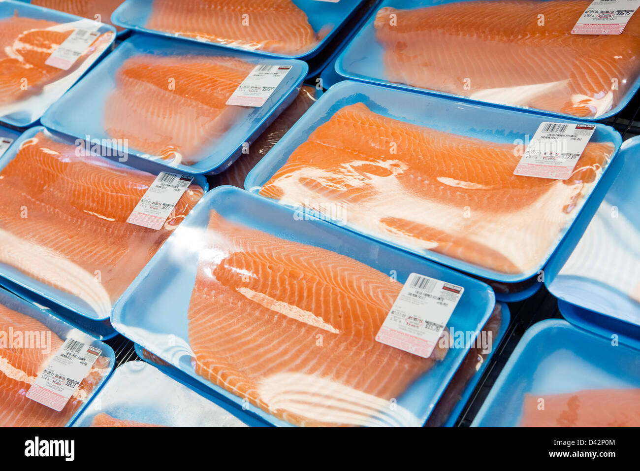 https://c8.alamy.com/comp/D42P0M/salmon-fillets-on-display-at-a-costco-wholesale-warehouse-club-D42P0M.jpg