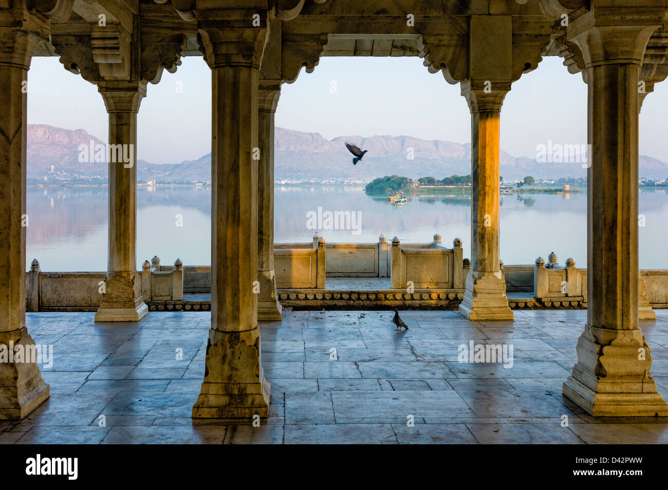 View of Anasagar lake from an open air marble platform at dawn. Anasagar lake is situated in Ajmer, Rajasthan, India. Stock Photo