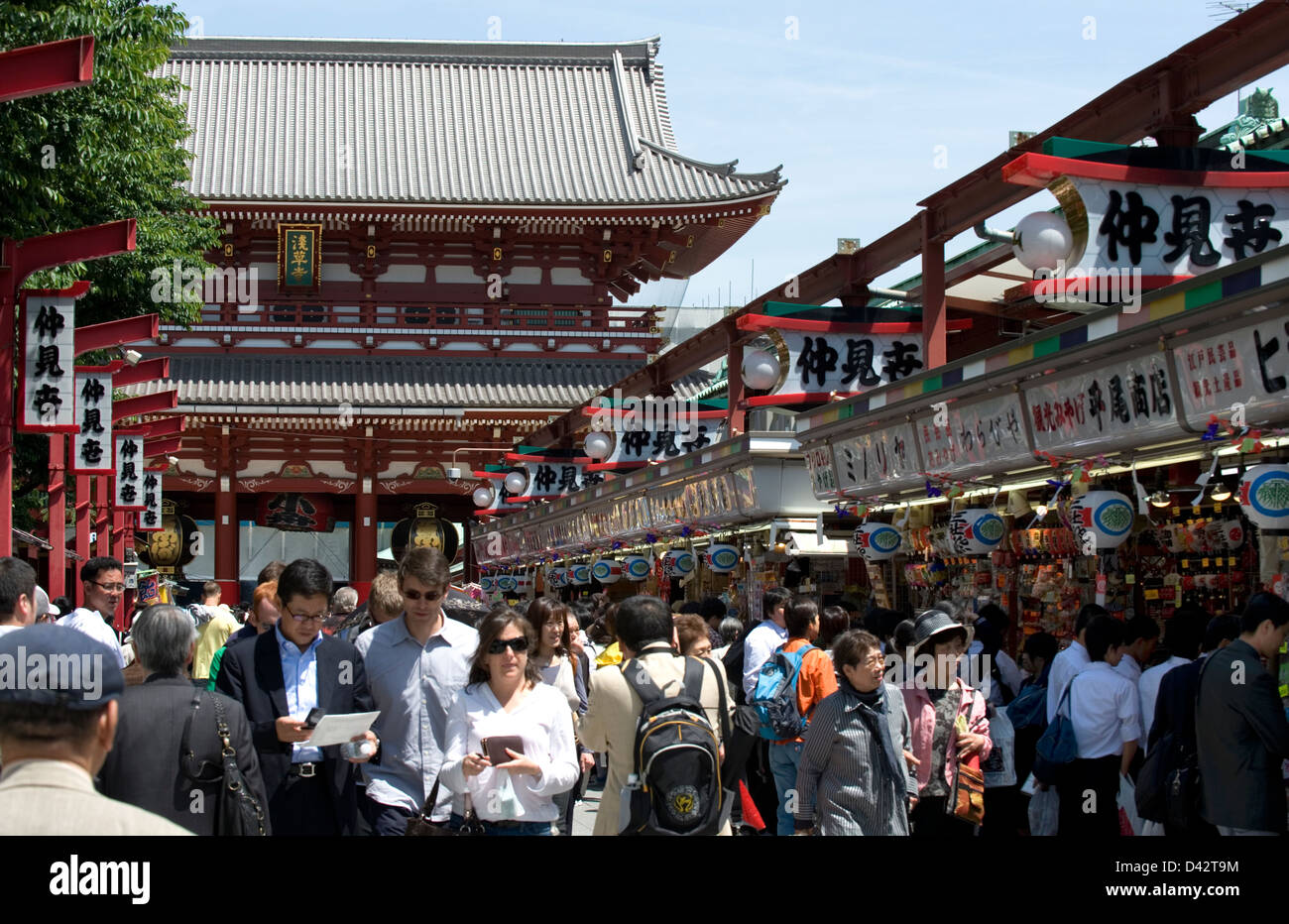 Nakamise-dori shopping street leading up to Sensoji Temple in Asakusa, Tokyo is lined with tourist shops crowded with sightseers Stock Photo