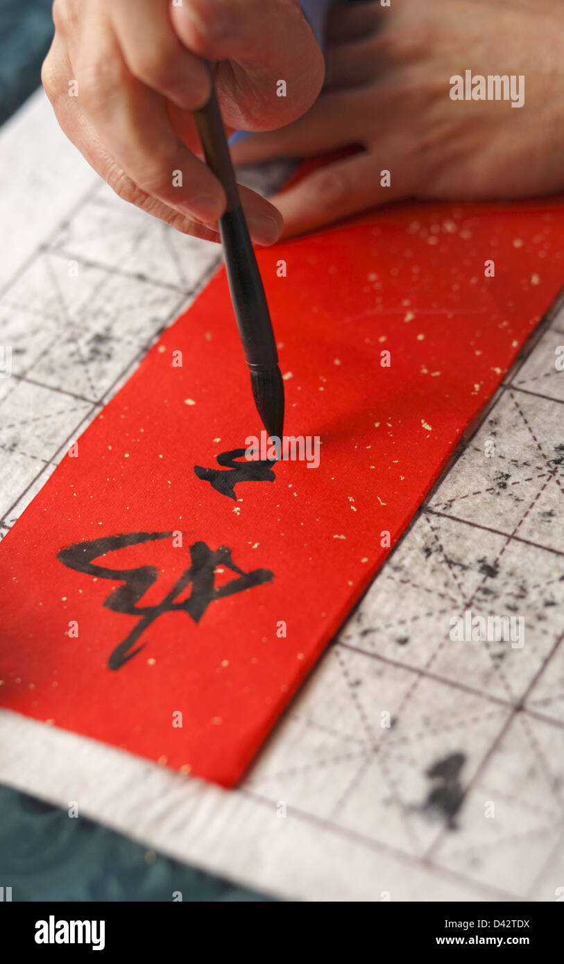 Chinese calligraphy writing hand hires stock photography and images