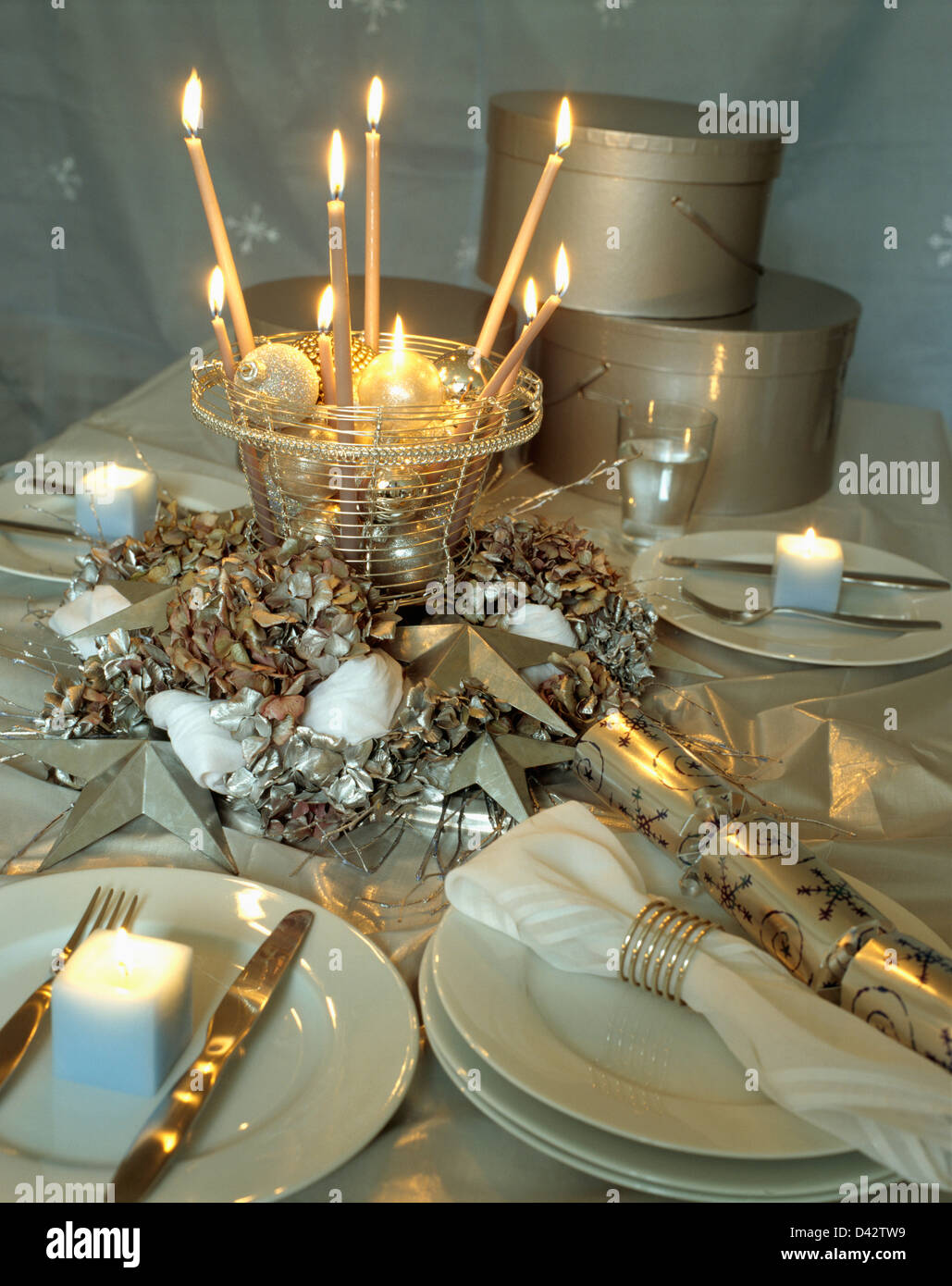 Lighted Taper Candles In Metalwork Basket In Decoration Of Sprayed