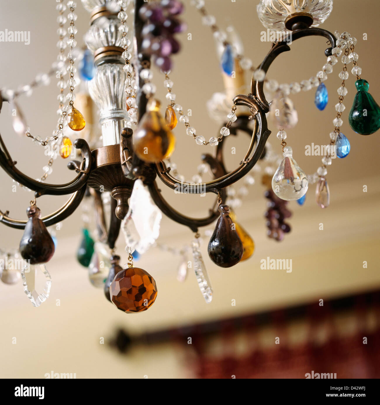 Close-up of metal chandelier decorated with glass droplets and beads ...