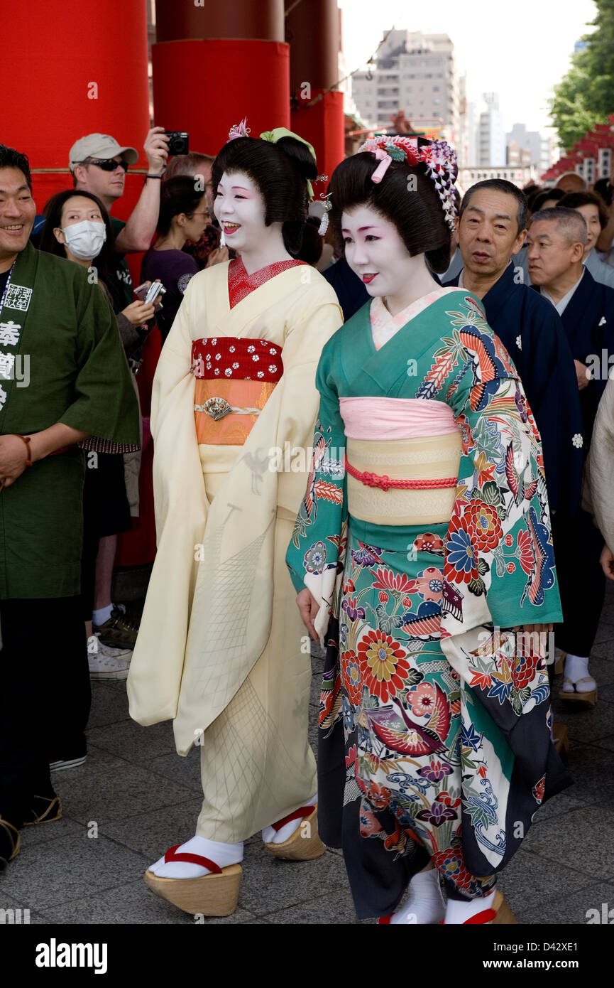A procession of fake maiko, or geisha apprentice, is part of the festivities at the Sanja Matsuri Festival at Sensoji Temple Stock Photo