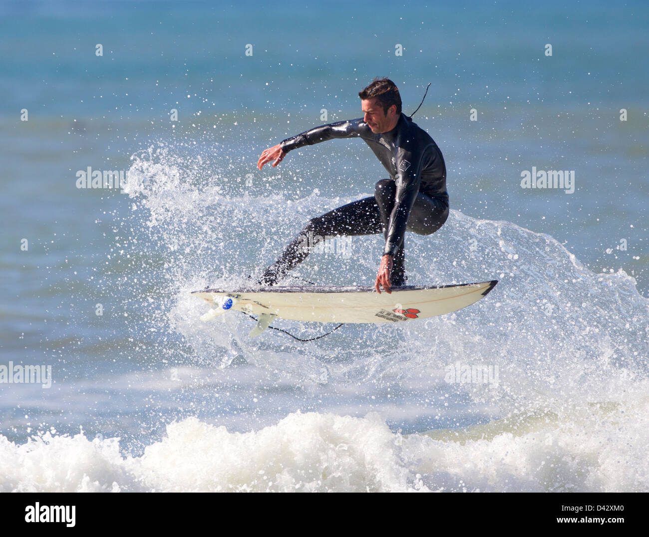 Surfer airborne hi-res stock photography and images - Alamy