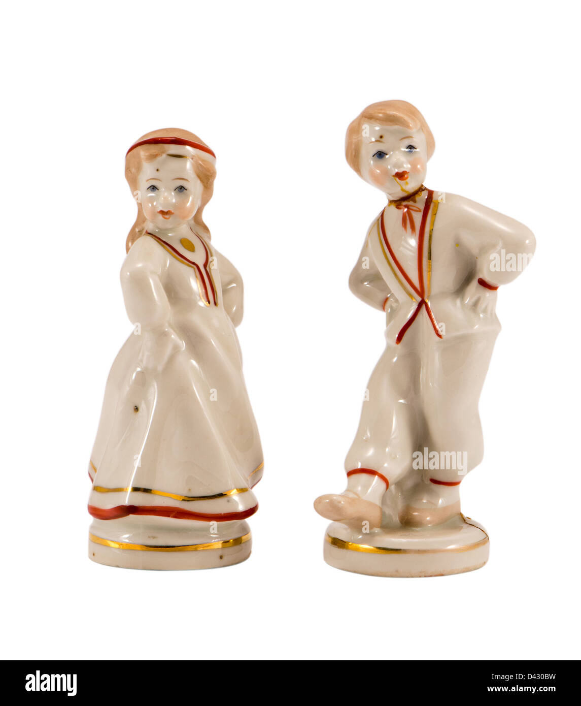 two ceramic toy decor dancers statue boy and girl isolated on white