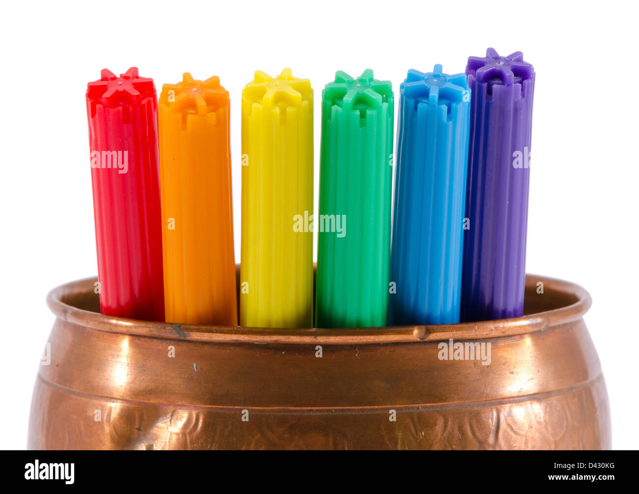 closeup of gay color felt-tip pens in copper bowl isolated on white background Stock Photo