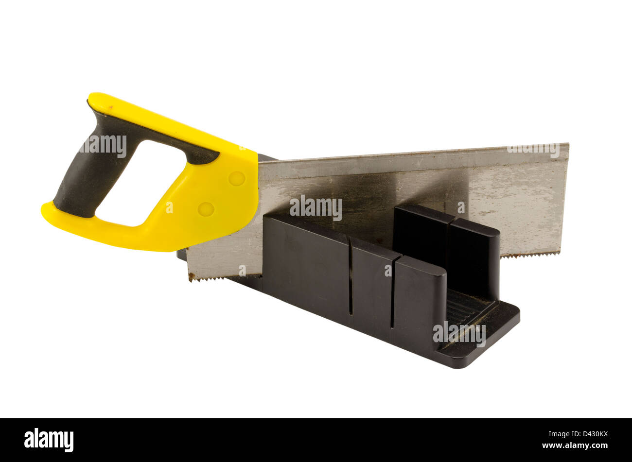 plastic hand saw and angle cut miter box tool isolated on white