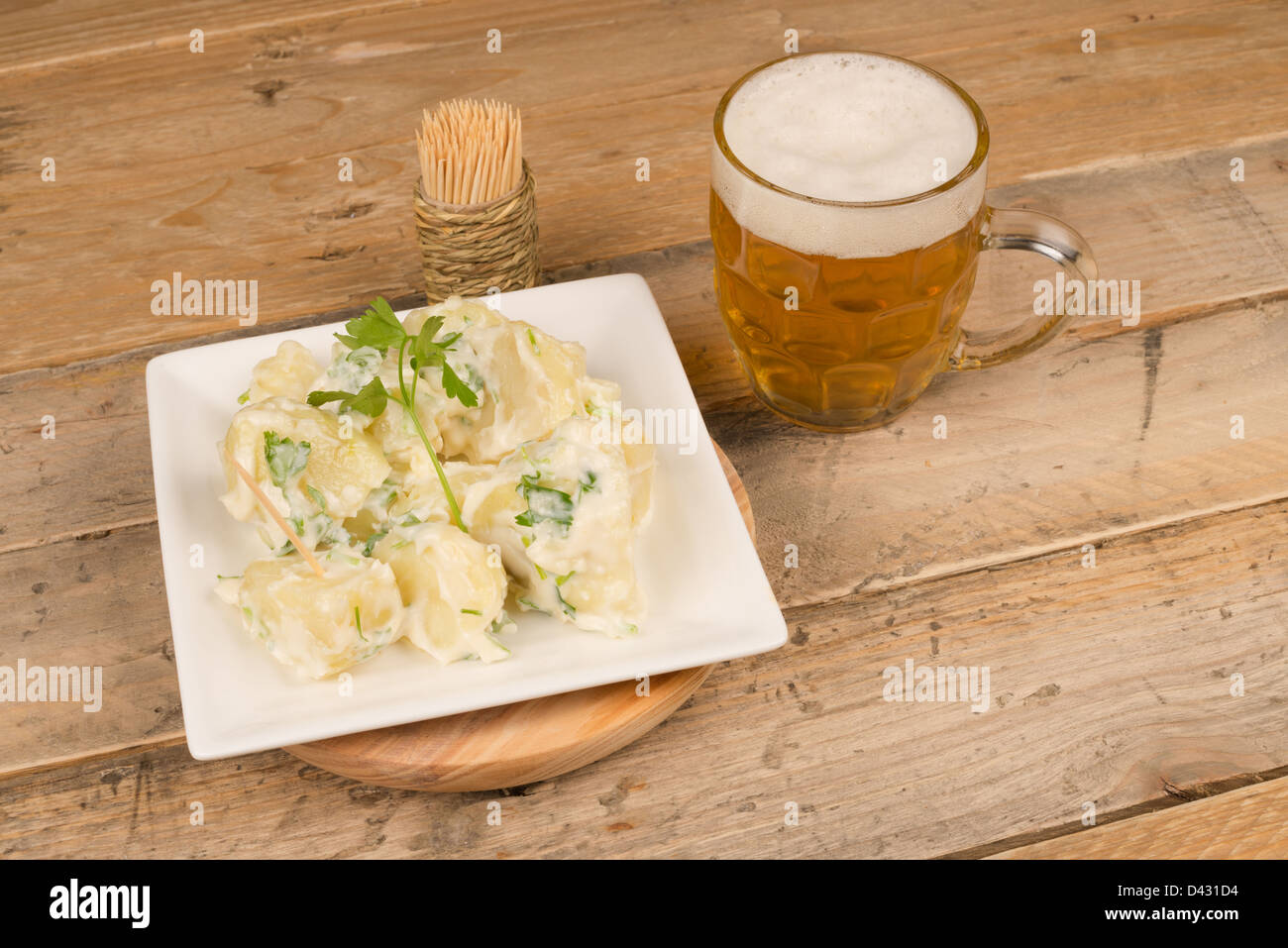Spanish potato tapa with a spicy garlic sauce Stock Photo Alamy
