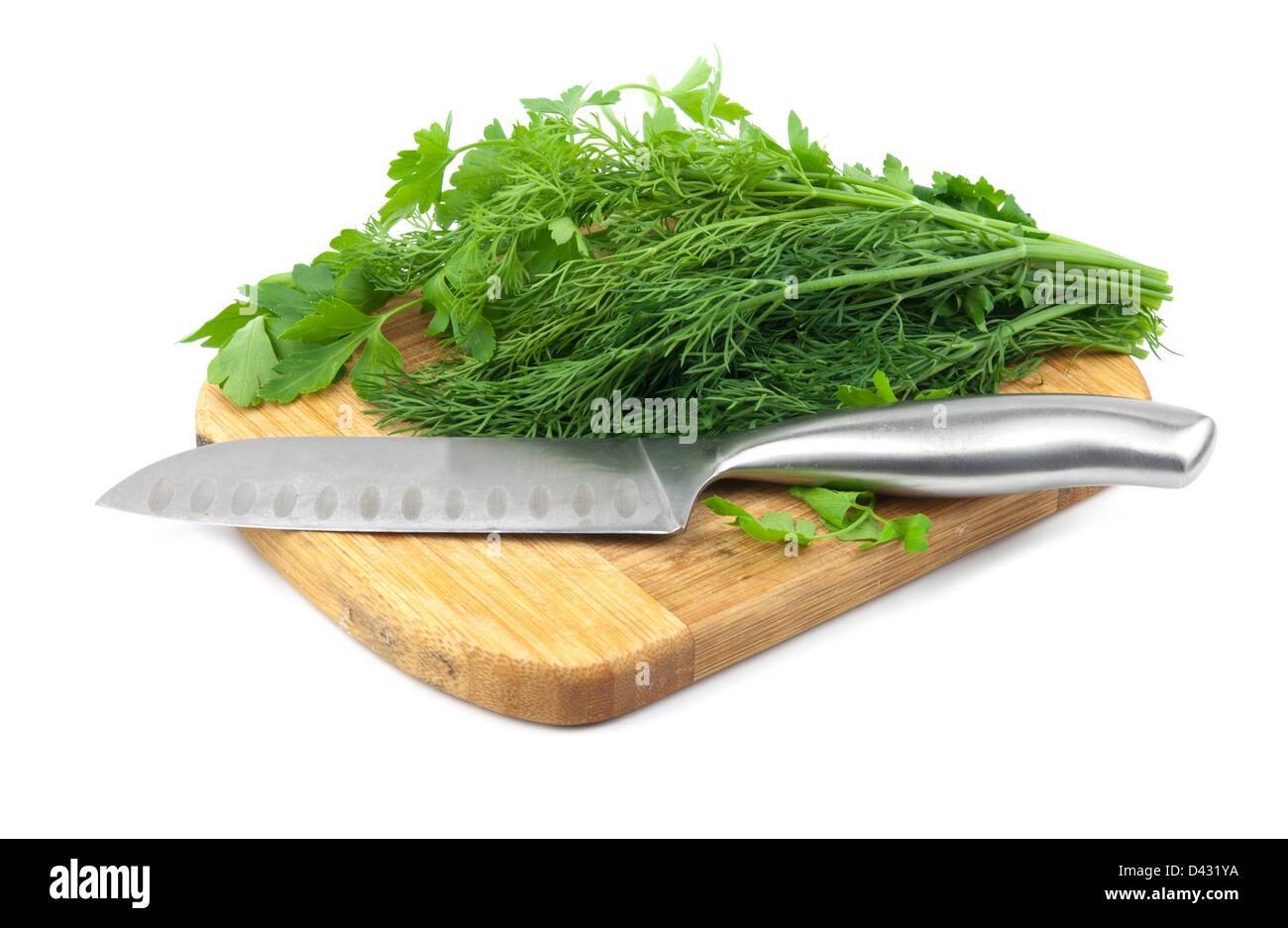 https://c8.alamy.com/comp/D431YA/fresh-dill-and-parsley-on-a-cutting-board-with-knife-D431YA.jpg