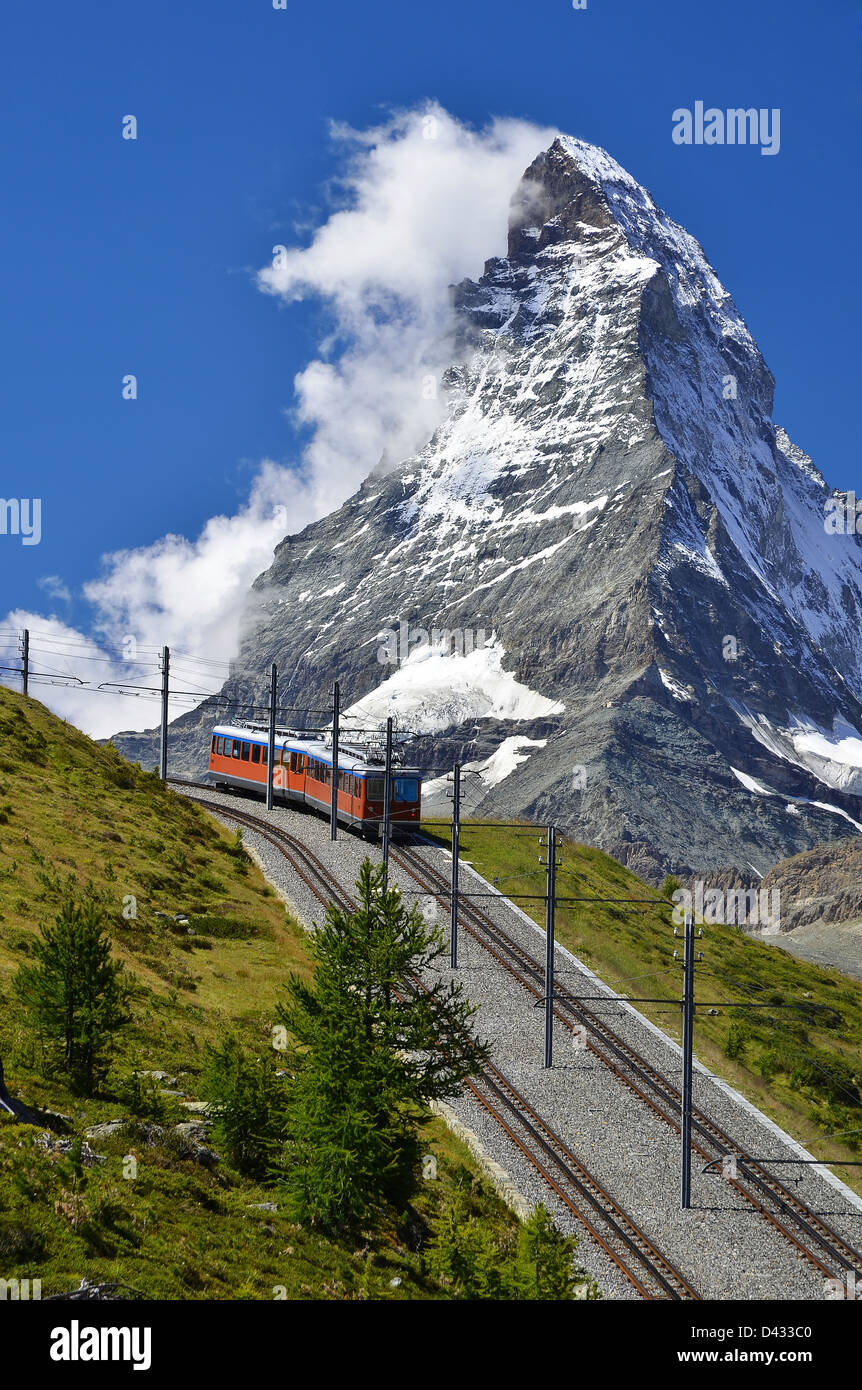 The Gornergratbahn is long gauge mountain rack railway. It leads from Zermatt (1604 m), up to the Gornergrat. Stock Photo
