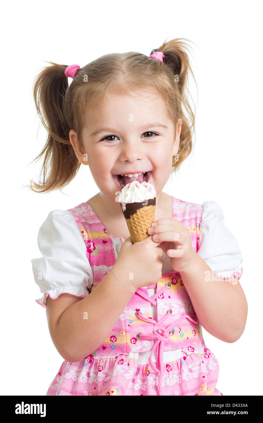 joyful child girl eating ice cream in studio isolated Stock Photo - Alamy