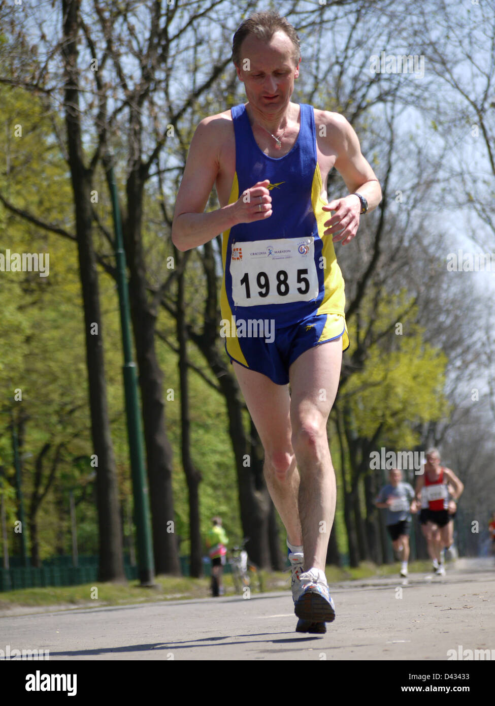 Marathon racer taking part in International Cracovia Marathon, held annually in Krakow, Poland Stock Photo