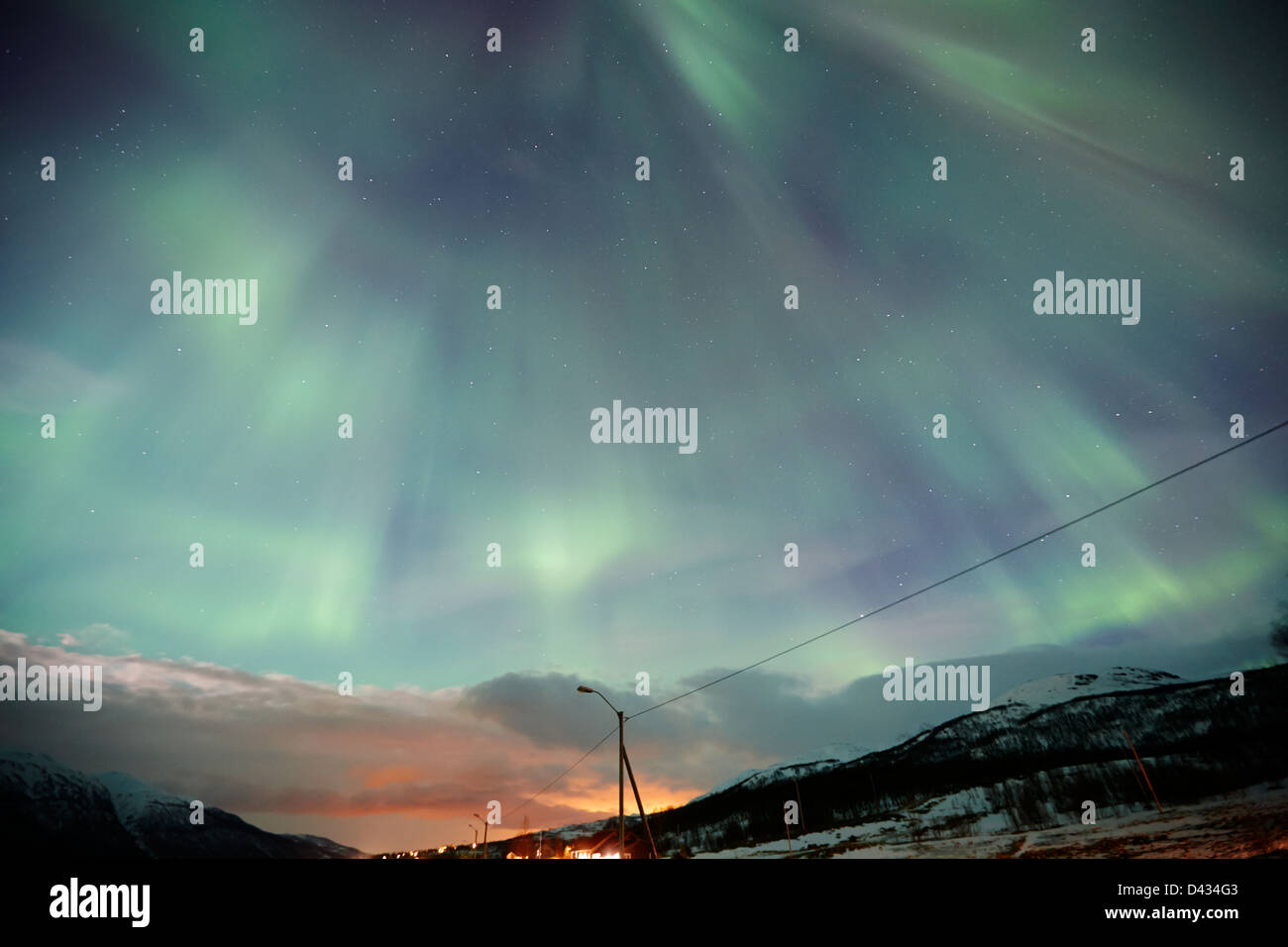 red and green corona northern lights aurora borealis near tromso in ...