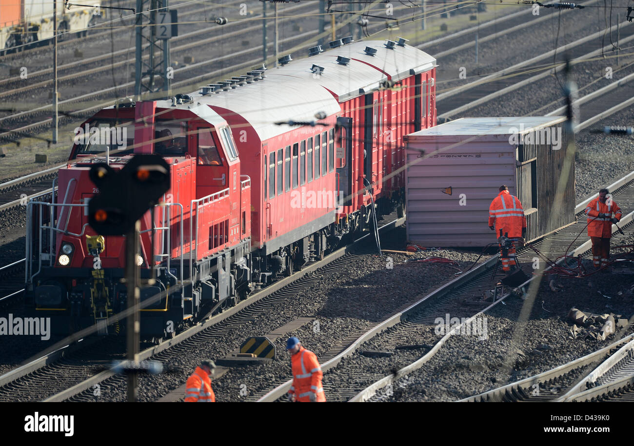 Freight trains are derailed at the fright yard Hannover-Linden in Hanover, Germany, 02 March 2013. The derailed trains caused interruptions and delays in train transportation. Photo: Peter Steffen Stock Photo
