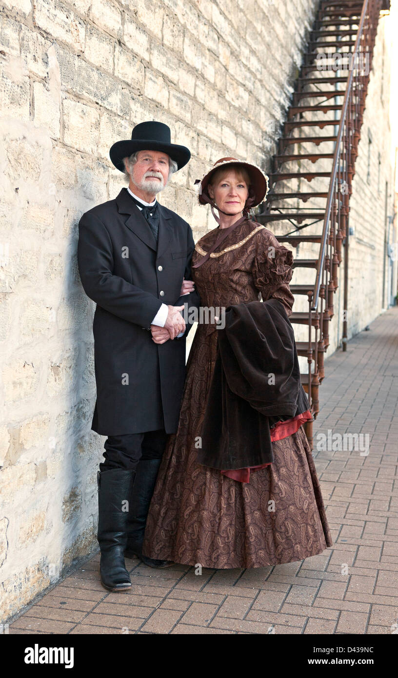 Man and woman in typical 1800s western clothing Stock ...