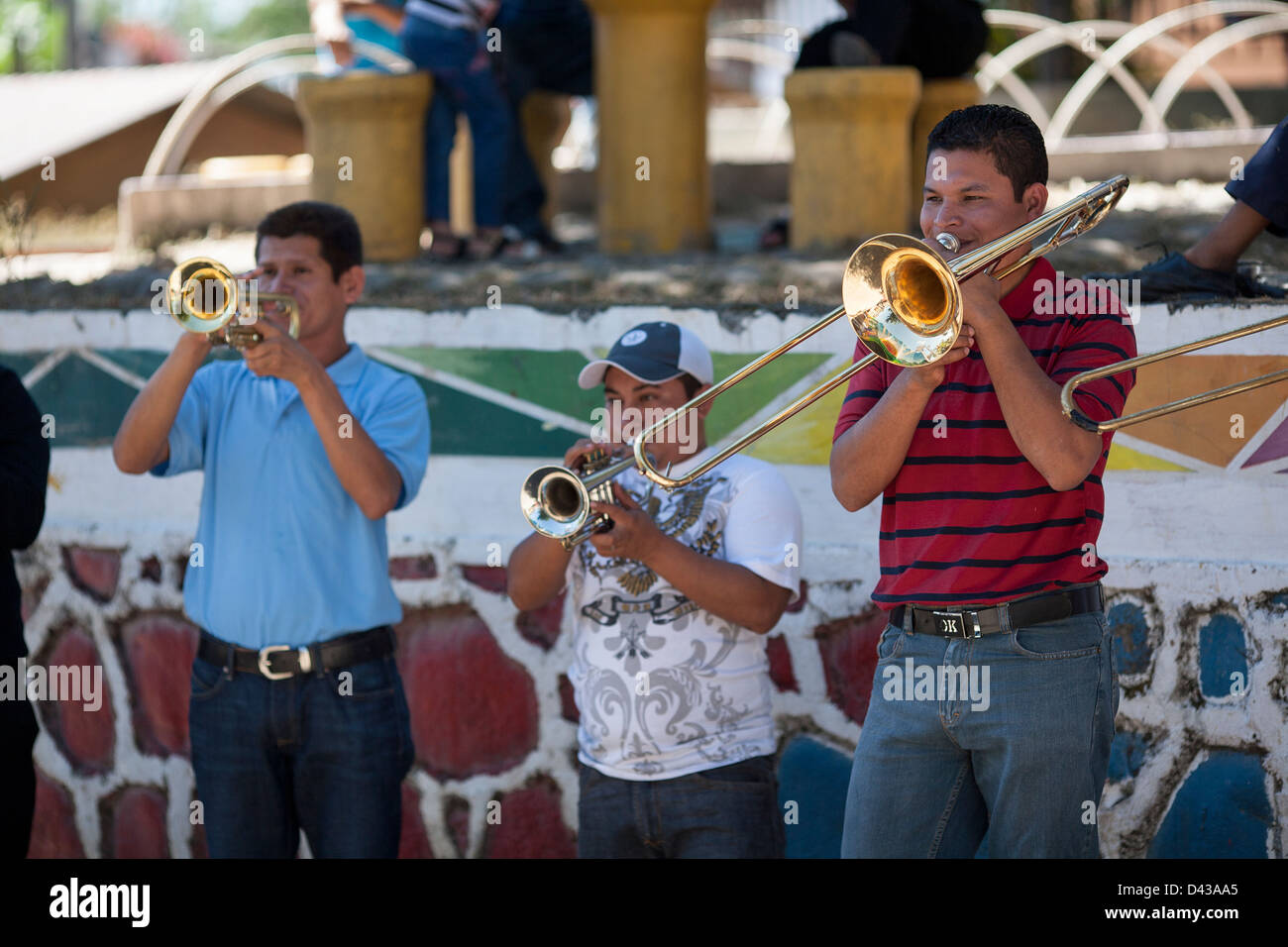 A group of musicians play music in the plaza during the fiesta de San