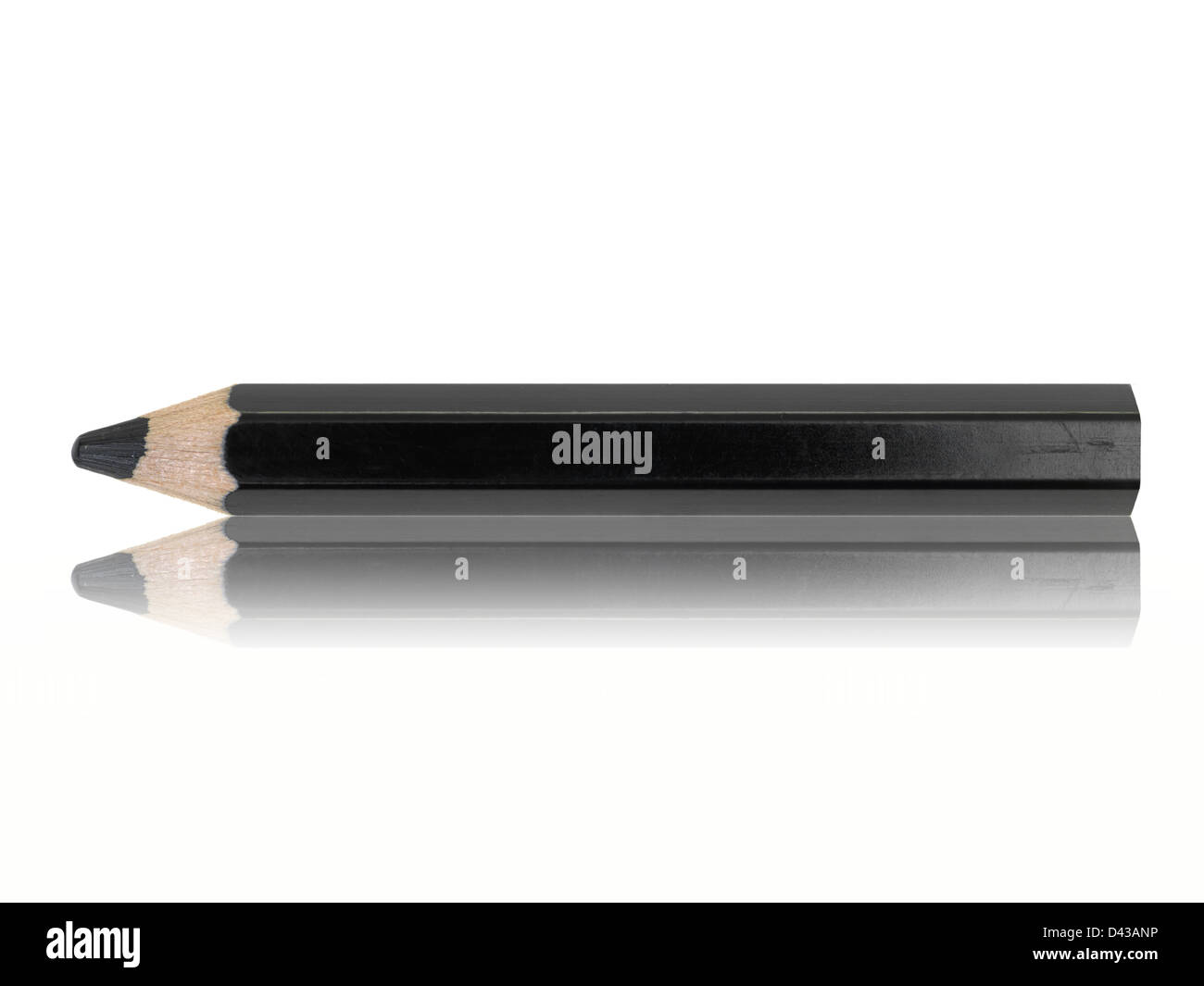 A black pencil isolated against a white background Stock Photo - Alamy