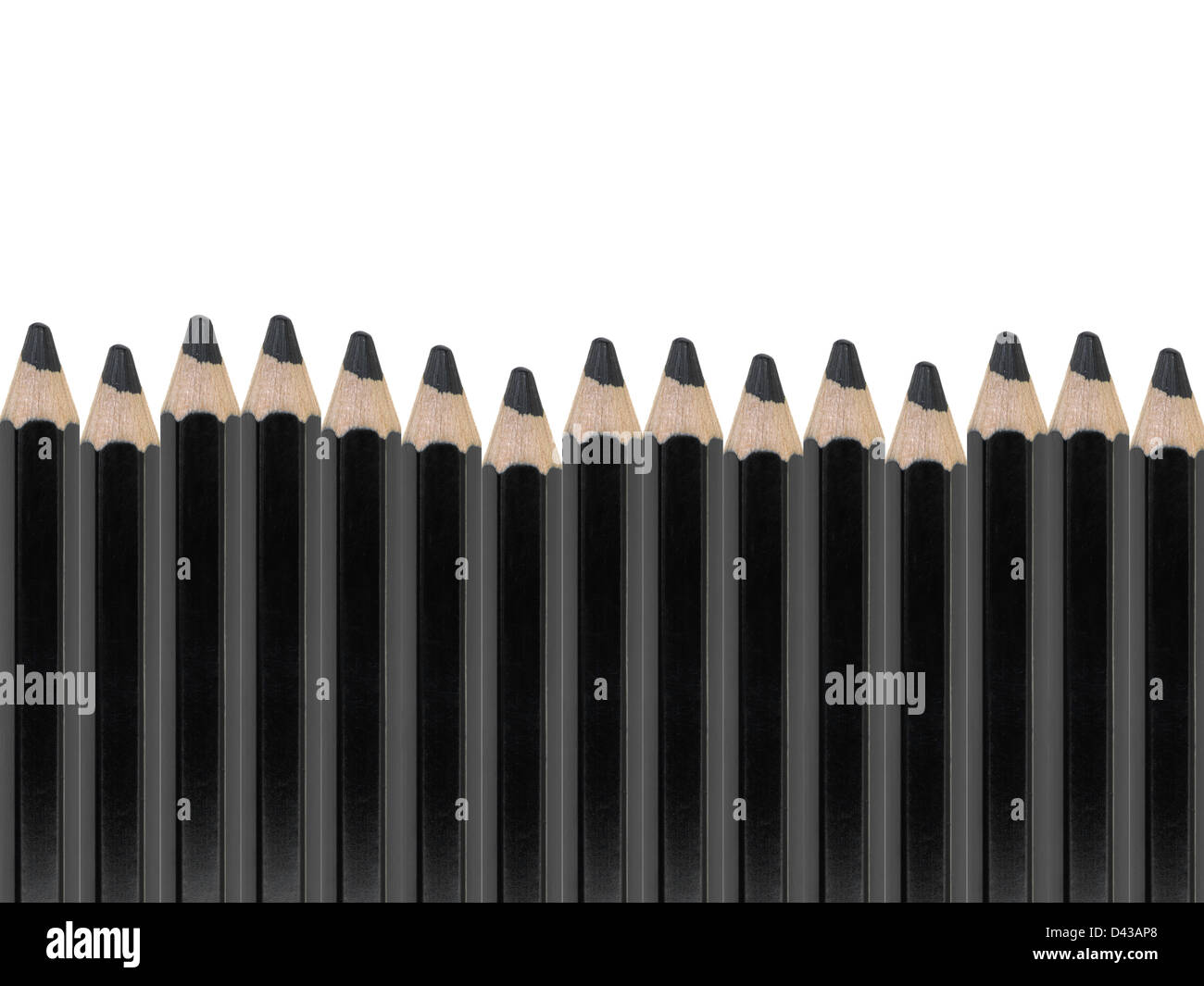A black pencil isolated against a white background Stock Photo - Alamy