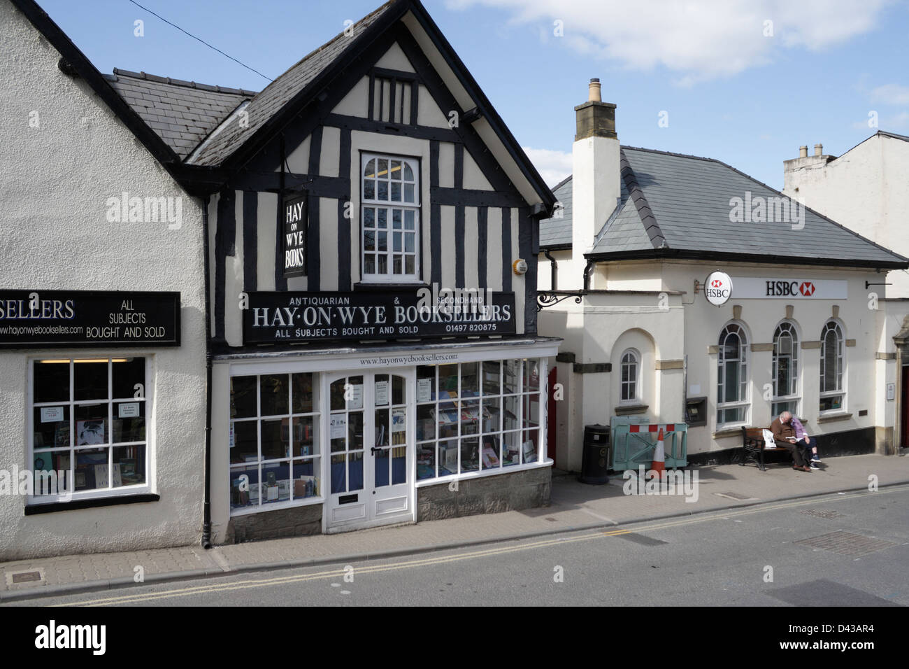 The Hay on Wye Bookshop adjacent to the HSBC Bank, Powys Mid Wales Stock Photo