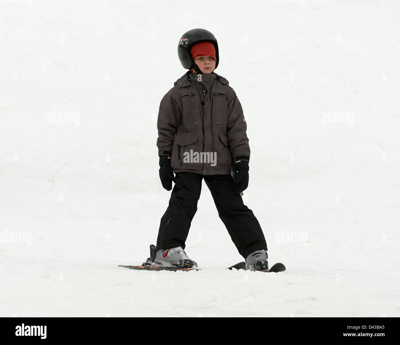 Child Young Boy skiing, winter season, snow Stock Photo