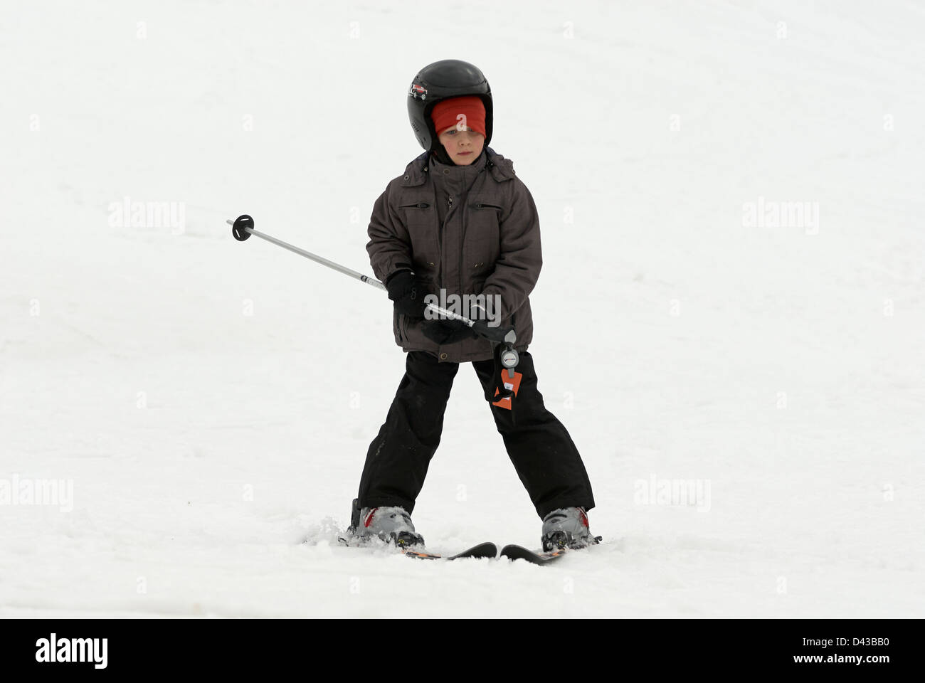 Child Young Boy skiing, winter season, snow Stock Photo