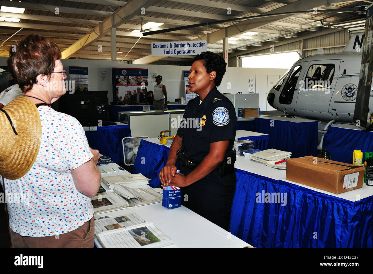 U.S Customs & Border Protection Field Officer Answers Questions Stock ...