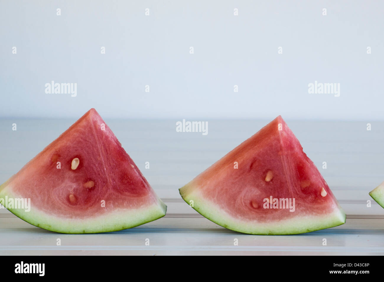 Fresh slices of watermelon on white background Stock Photo - Alamy