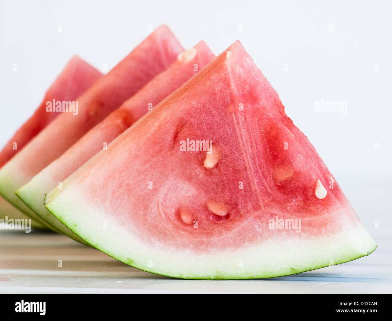 Fresh slices of watermelon on white background Stock Photo - Alamy