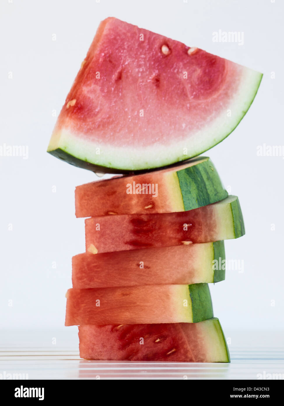 Fresh slices of watermelon on white background Stock Photo - Alamy