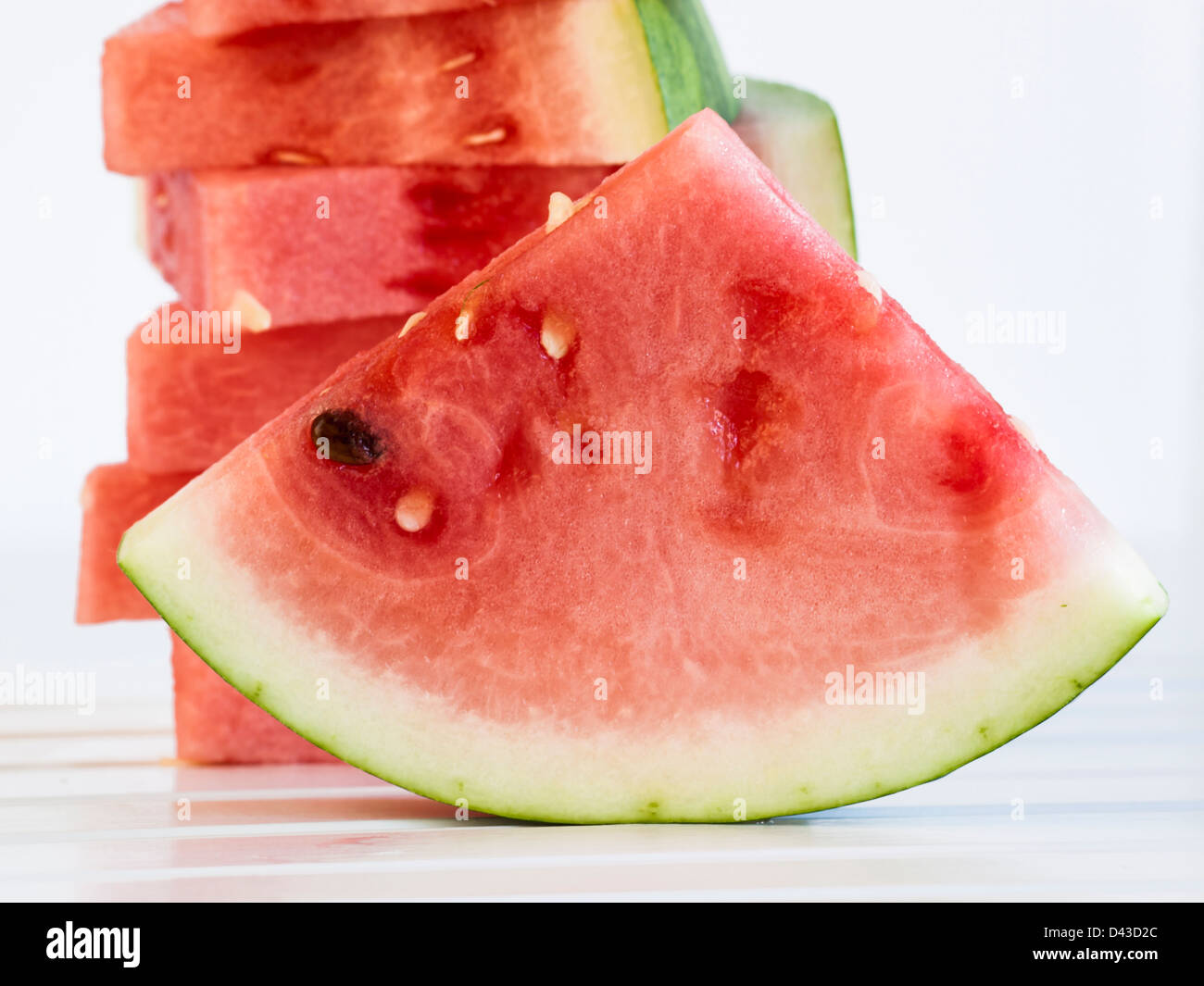 Fresh slices of watermelon on white background Stock Photo - Alamy
