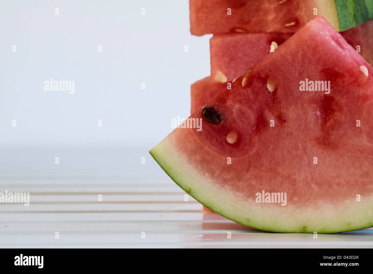 Fresh slices of watermelon on white background Stock Photo - Alamy