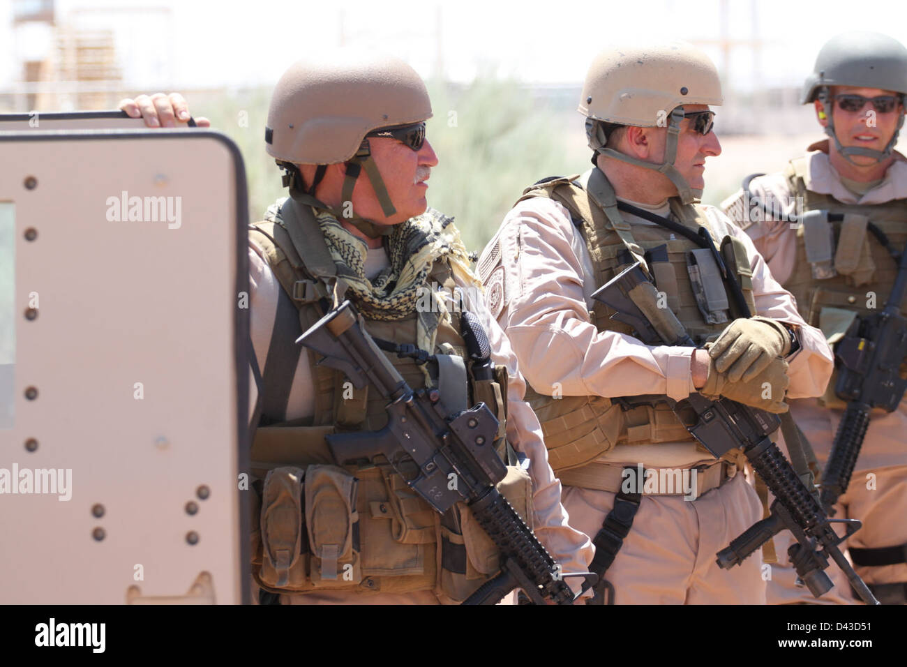 A U.S. Customs & Border Protection support team is shown in action ...