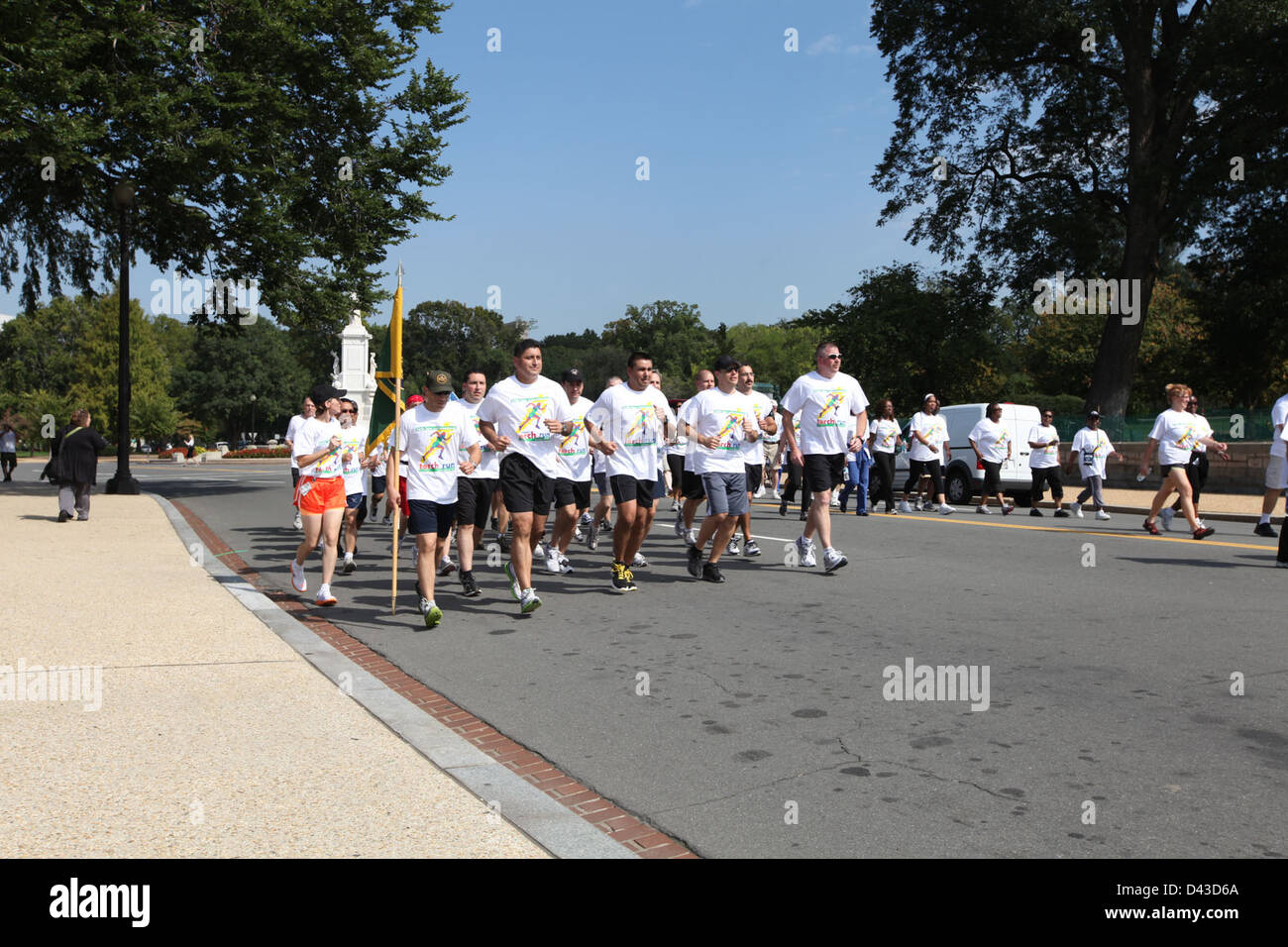 This image captures the Law Enforcement Torch Run (LETR) event, where ...