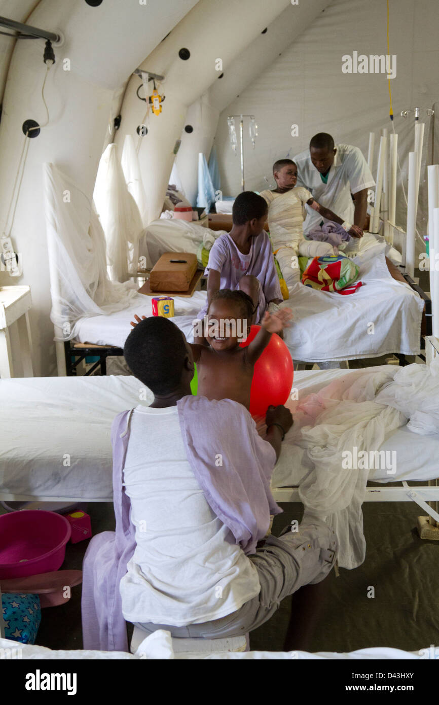 children playing with balloon in the burn unit in Drouillard Hospital