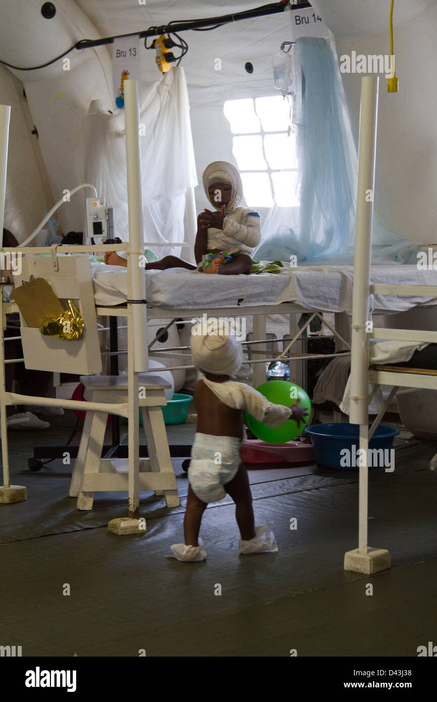 children playing with balloon in the burn unit in Drouillard Hospital