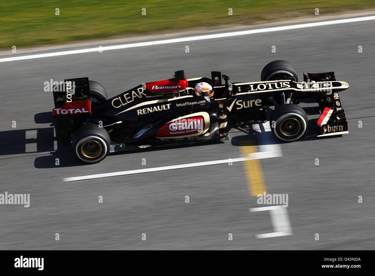 Romain Grosjean (FRA) Lotus F1 Team walks back to the pits Romain Grosjean (FRA) Lotus F1 Team walks back to the pits