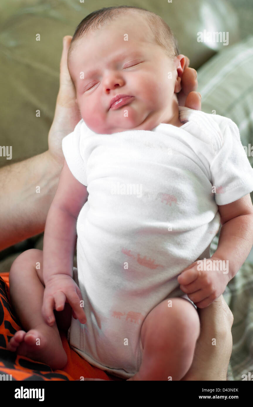 Girl holding newborn baby hi-res stock photography and images - Alamy