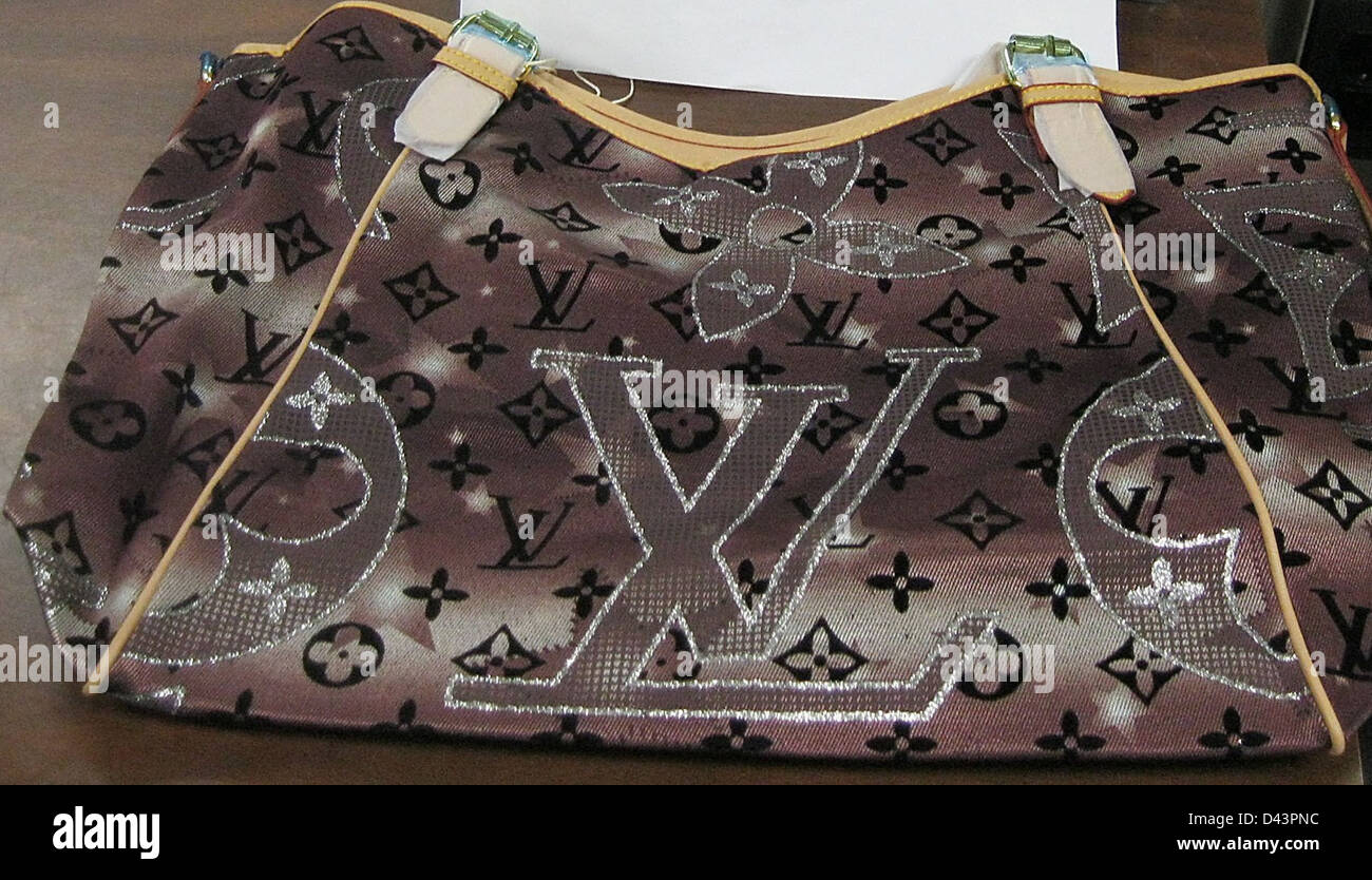 A counterfeit Louis Vuitton purse in the Fake or Real display, The Mob  Museum, Las Vegas (City of Las Vegas), Nevada, United States Stock Photo -  Alamy